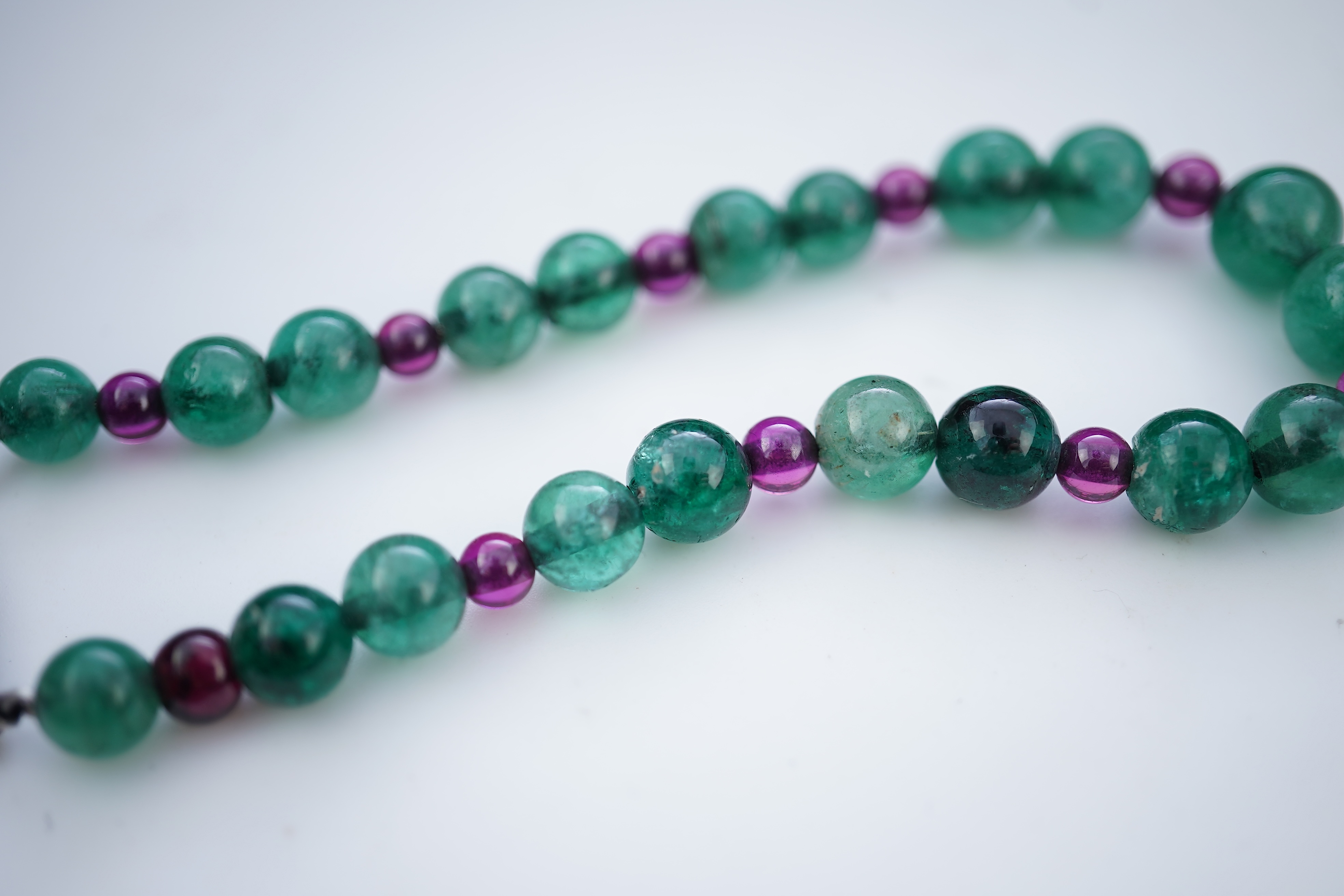 An Art Deco emerald, synthetic ruby and diamond bracelet, first half 20th century